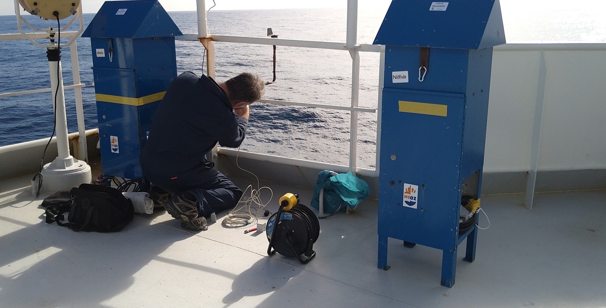 NIOZ technician Bob installing dust collectors on the highest deck of RV Pelagia